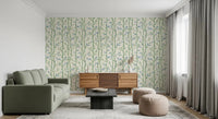 Ivory wallpaper works well behind a bed with soft layered styling