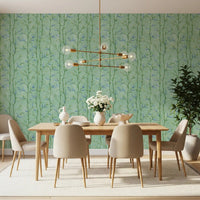 Bamboo leaf wallpaper in a dining area with pale blue and green accents