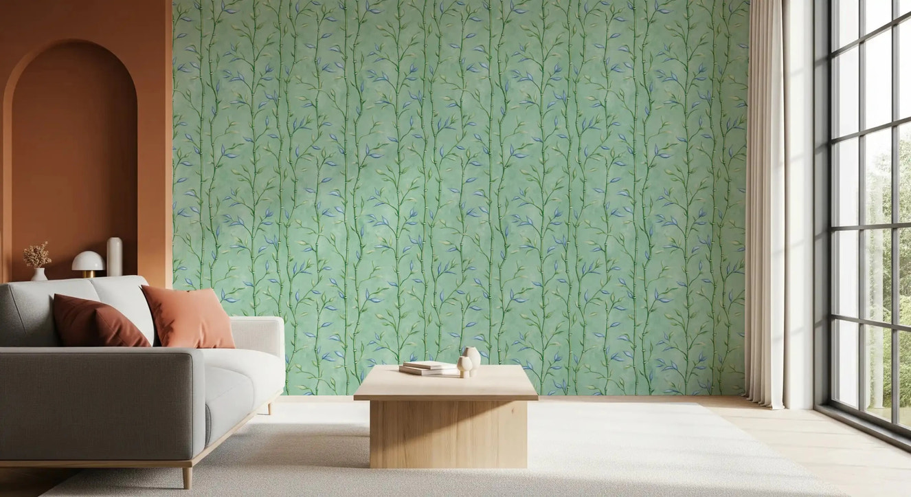 Bamboo wallpaper in a living room with minty teal background and blue leaves