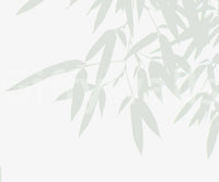 A modern botanical wallpaper featuring subtle bamboo leaf forms for a fresh, airy feel.