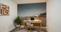 Neutral lounge with scenic wall mural view
