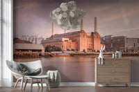 Calm water reflection next to the hallway Battersea Power Station wall mural.