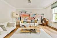 A beautiful coastal rock wallpaper mural with crashing waves.

