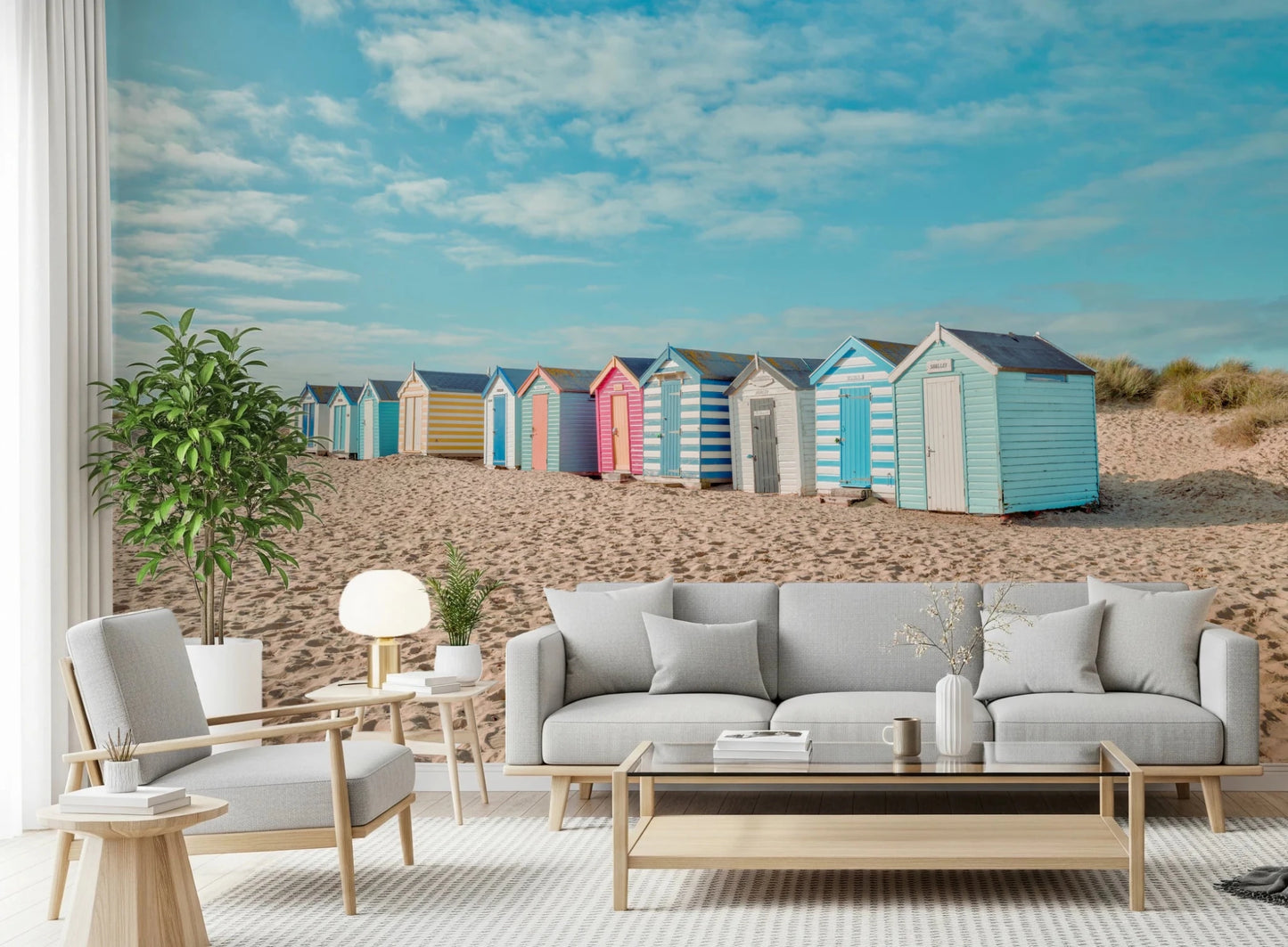 Blue and yellow beach huts wall mural for office area coastal wall decor.