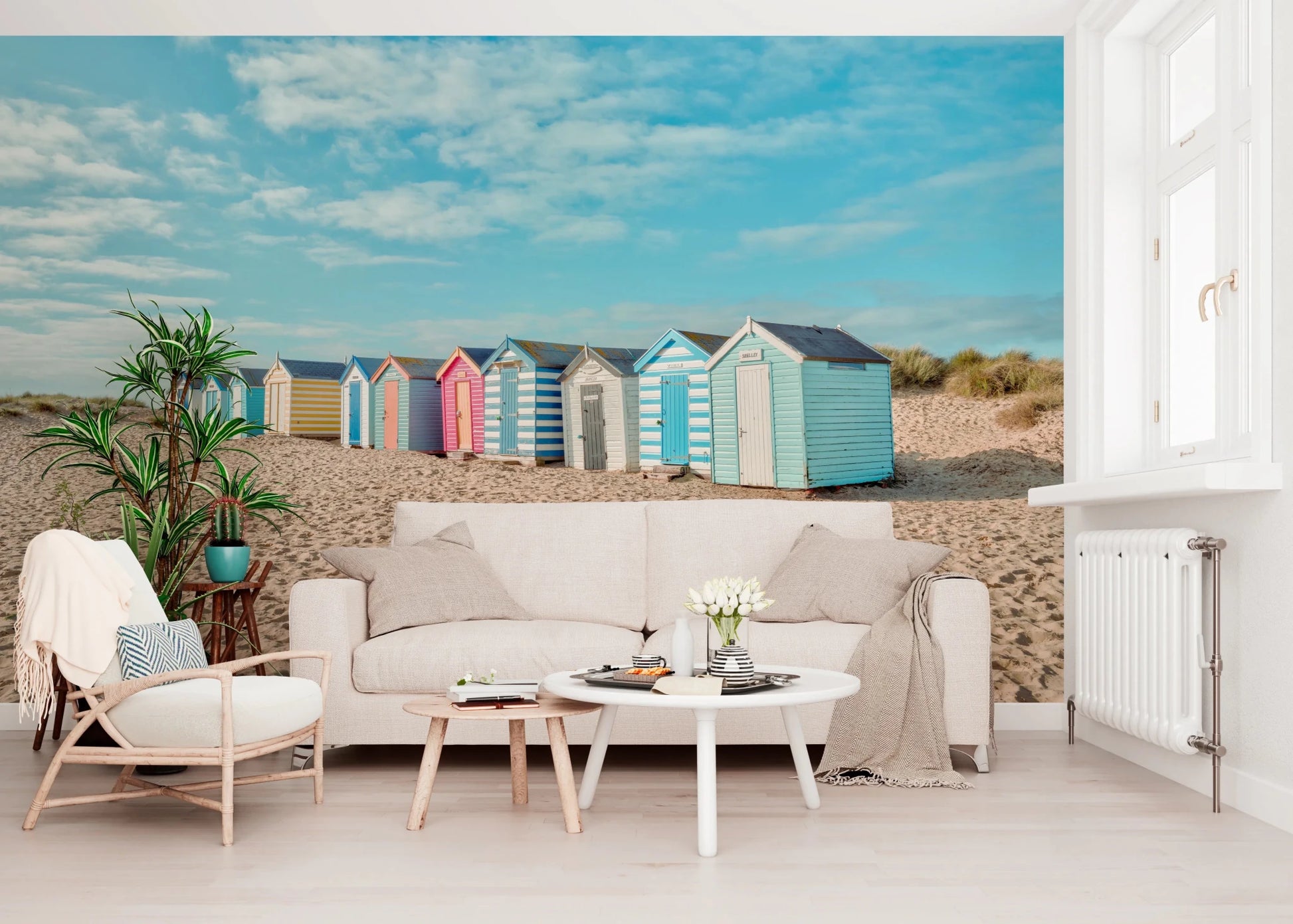 Striped wooden beach hut wall mural in a sunny coastal scene.
