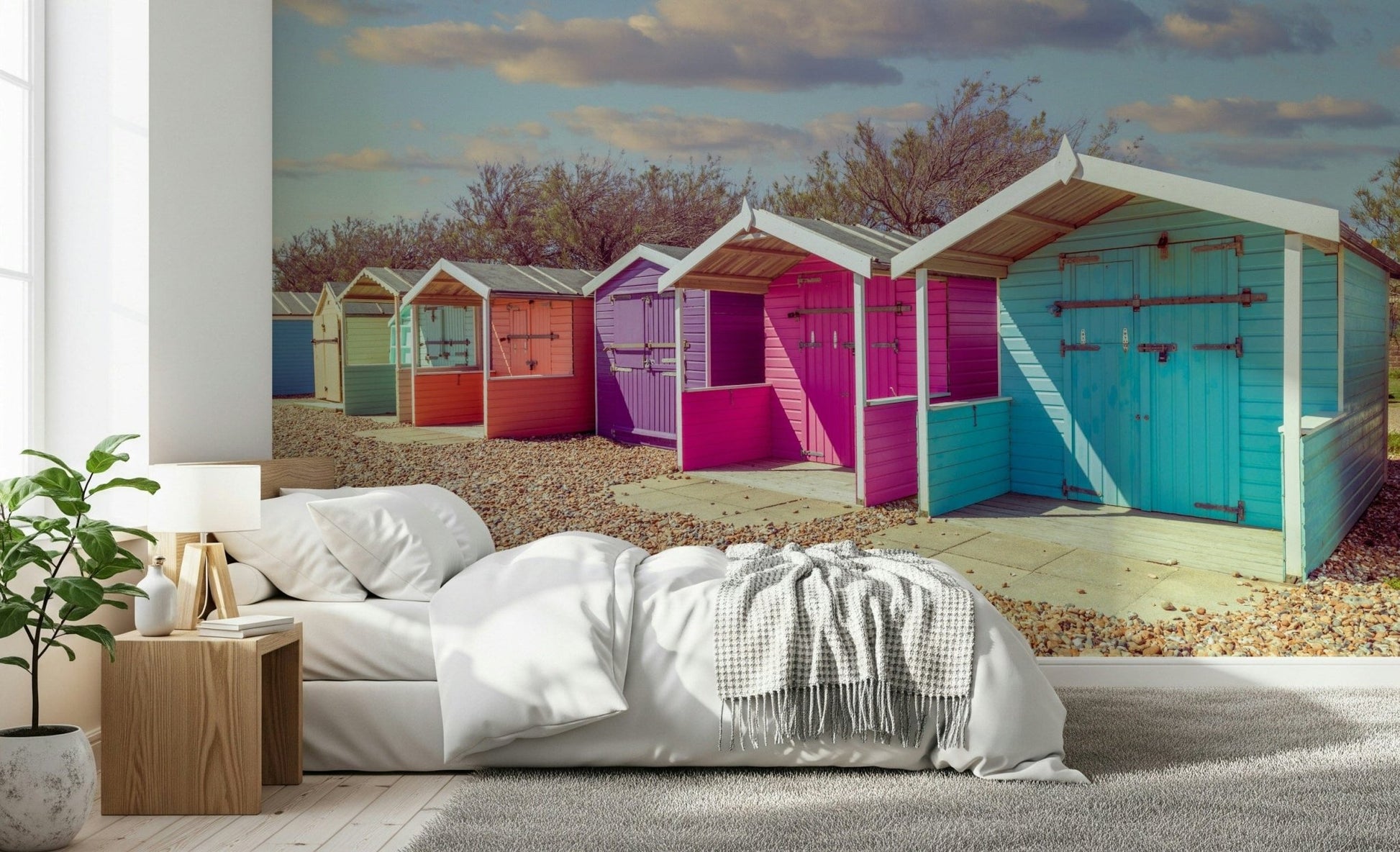 Vivid beach shed wallpaper, creating Beach Row Bliss at home.