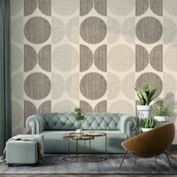 A graceful subtle circle wall mural in cool, neutral tones.

