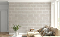 Rustic beige brick wallpaper mural with worn finish for a farmhouse or loft-inspired aesthetic.