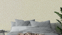 Light beige wallpaper with organic leafy motifs

