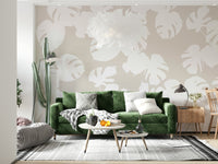 An artistic abstract leaf mural on minimalist wallpaper.

