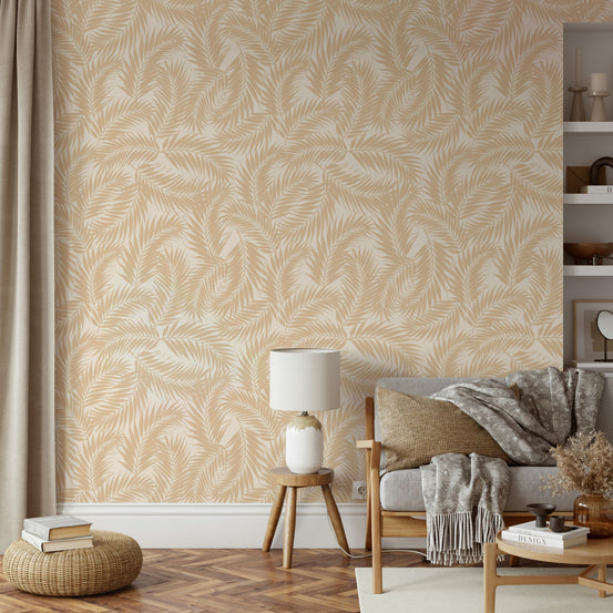 A full-wall mural showing a serene scene of palm trees.
