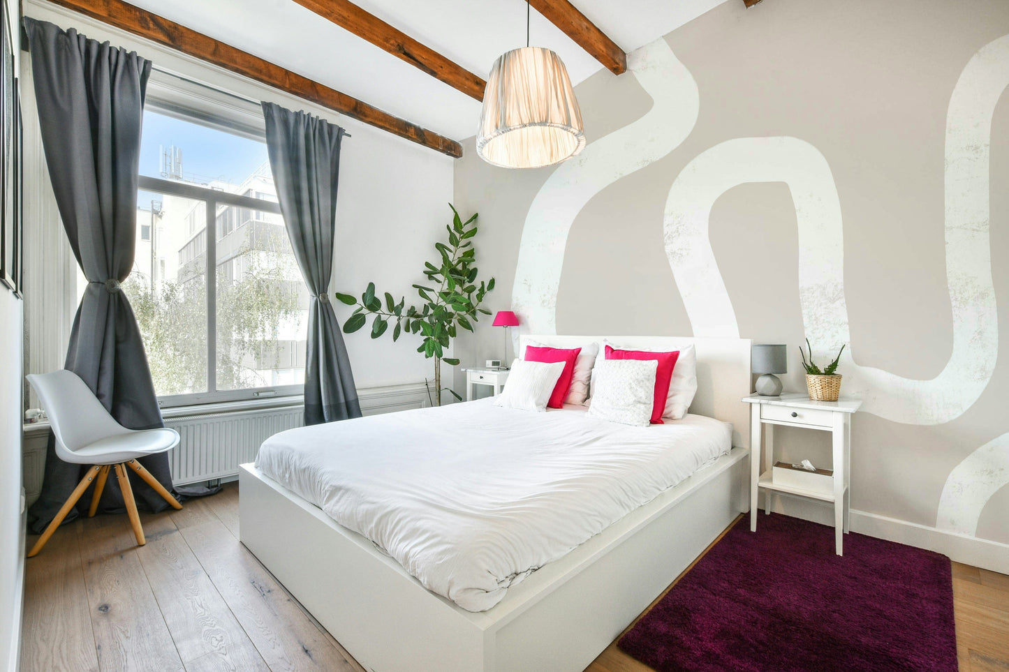 A beautiful modern art wall mural of a winding road.

