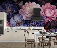 Aromatic Bouquet wallpaper mural of dark moody florals in a kitchen with wood cabinets and dining table