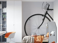 Wall with classic bicycle illustration wallpaper


