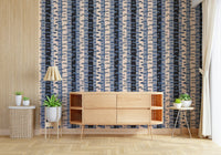 Living room media wall with graphic birch stripe pattern, blue black cream grey palette, modern look