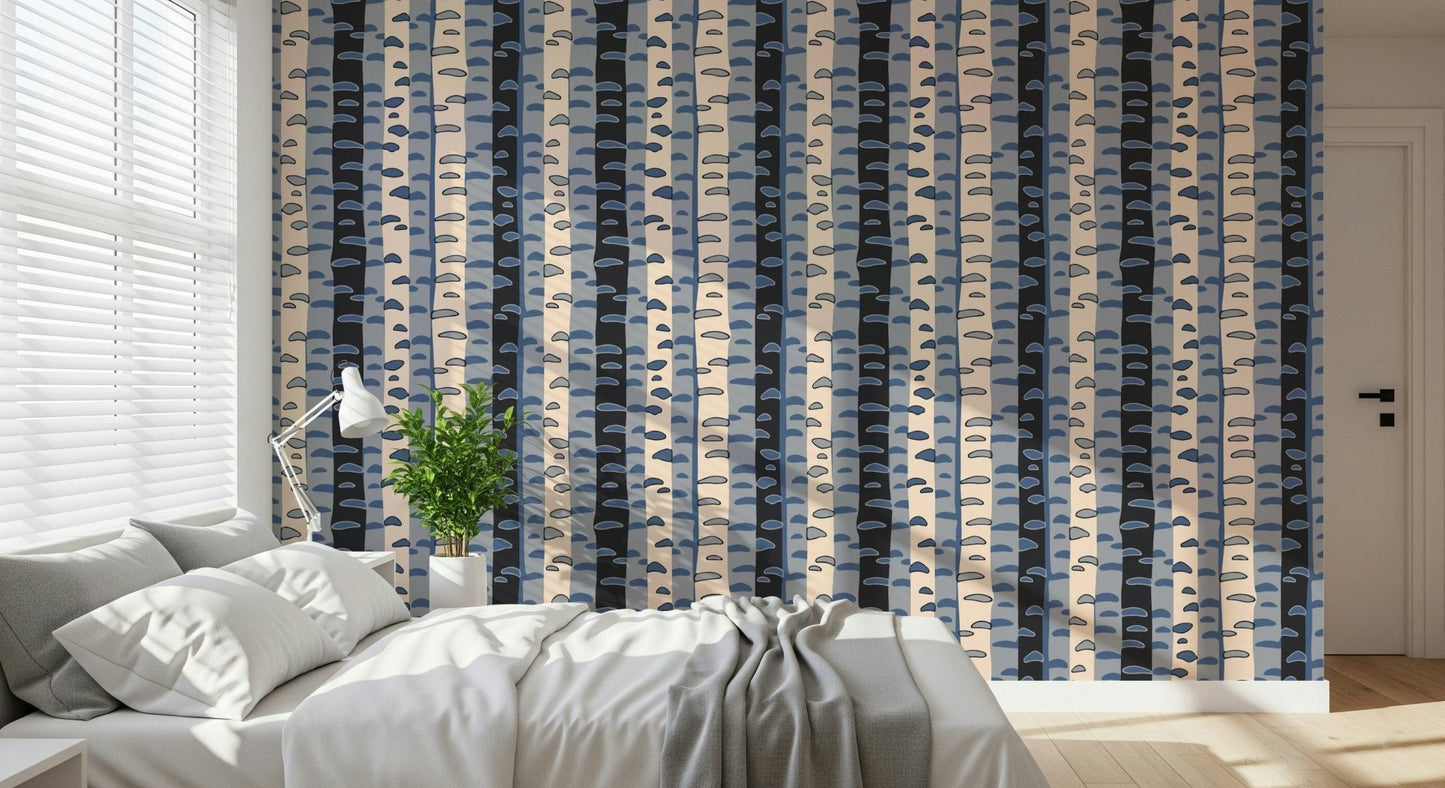 Retro abstract birch stripe wallpaper in blue, black, cream, and grey for a living space.