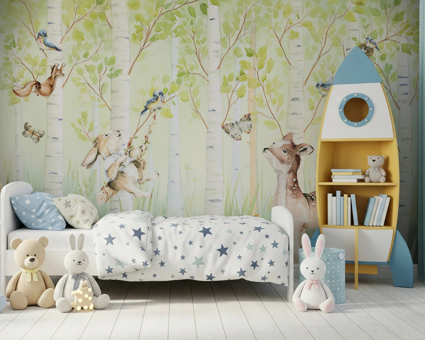 Birchwood Forest Friends Tales wallpaper mural of birch trees with a deer behind a white star-bedding bed and rocket bookshelf