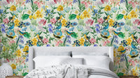 Nature-inspired wallpaper with birds perched among lush flowers

