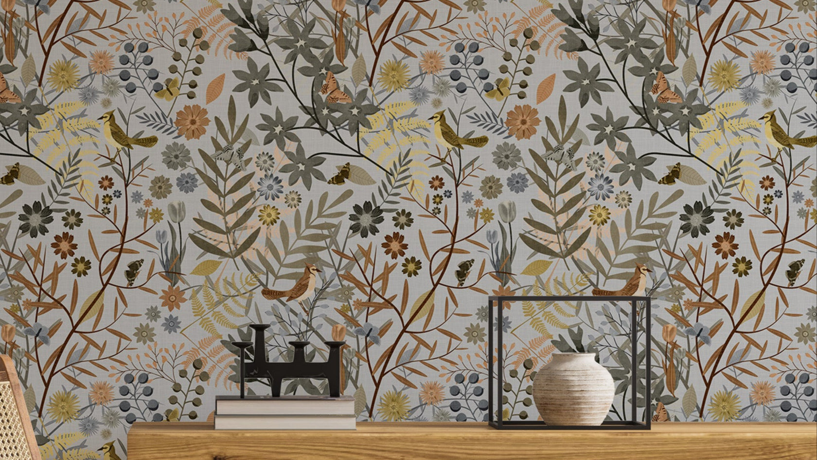 Birds Garden Golden Gray wallpaper close-up showing birds and golden flowers above a wood console with a vase