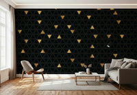 The Luxury Black and Gold Triangles mural, a contemporary geometric wallpaper with sharp, intersecting triangles for a sophisticated look.