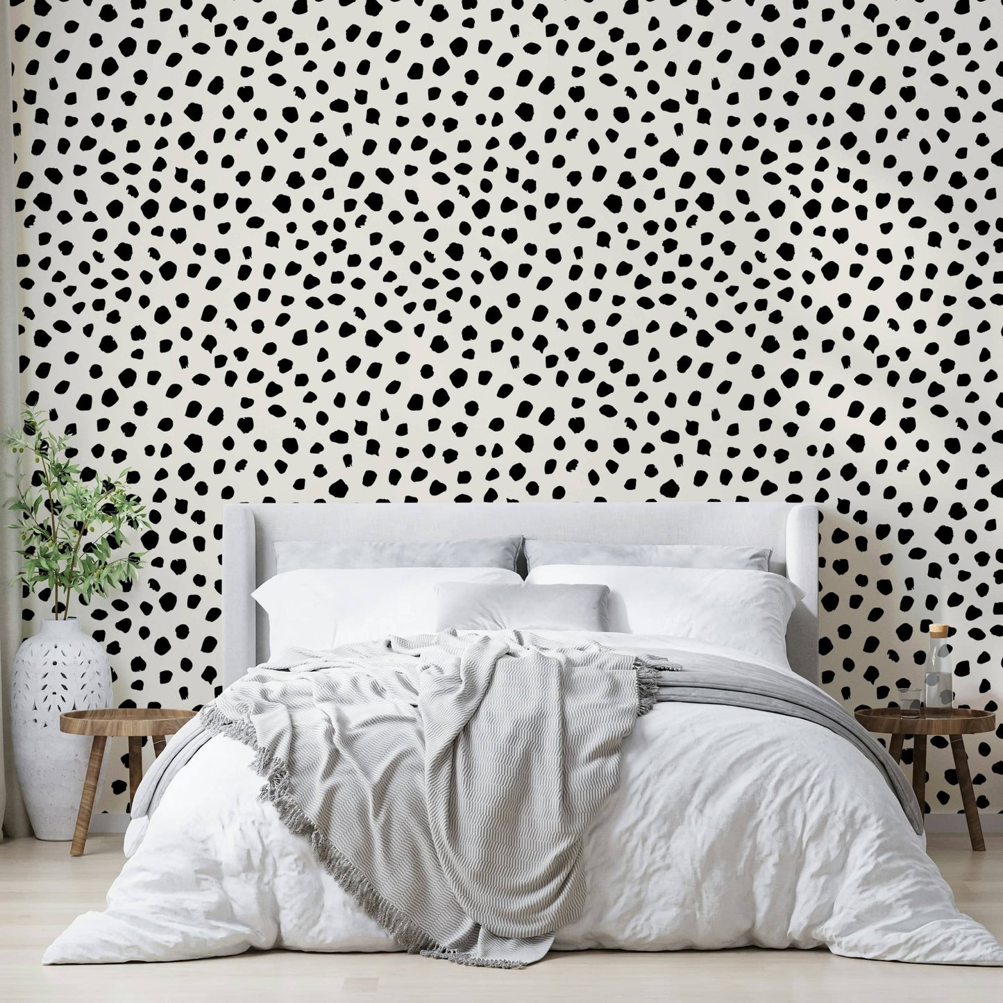 Modern dalmatian print wallpaper for a chic bedroom accent.
