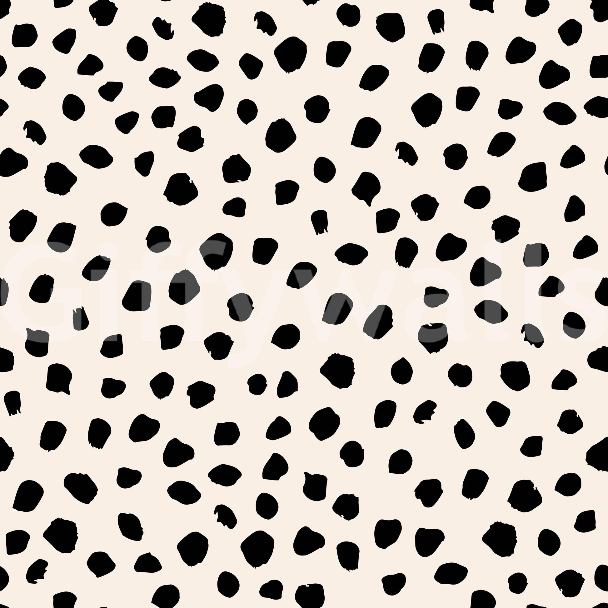 Artistic black dot wallpaper adds texture to any small room.
