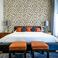 Organic scattered spot wallpaper for a modern room.
