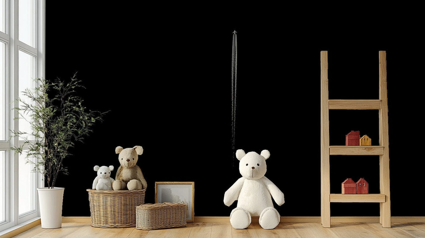 A bedroom with the black and white mural behind the headboard.

