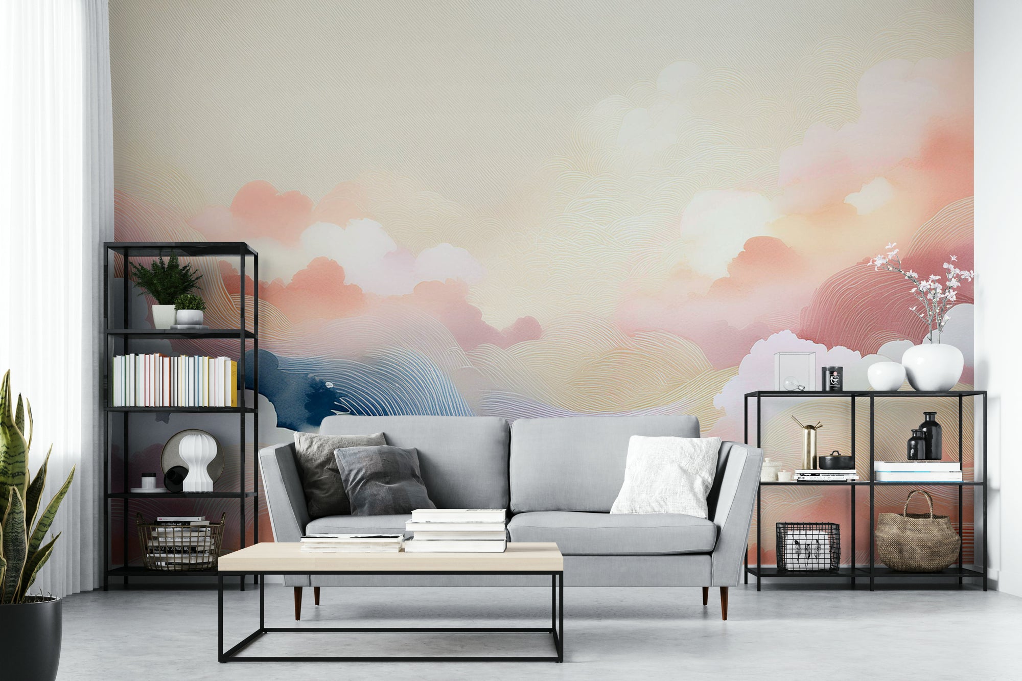 Blissful Skytones wallpaper mural with pastel pink and peach clouds behind a grey sofa and black etagere shelves