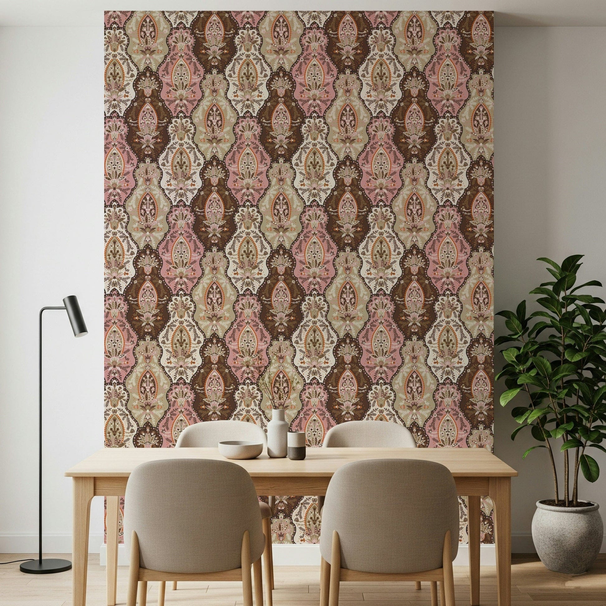 Patterned floral wallpaper with pink blossoms and ornate brown decorative motifs.