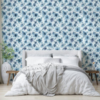 Blooming blue flowers on decorative wallpaper

