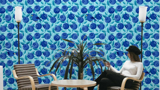 Blue birds among blueberries wallpaper

