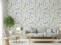 Blue Pastel Butterfly Garden Wallpaper providing a soft background for a home workspace.