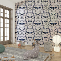 Artistic wallpaper in dark blue with moth motifs

