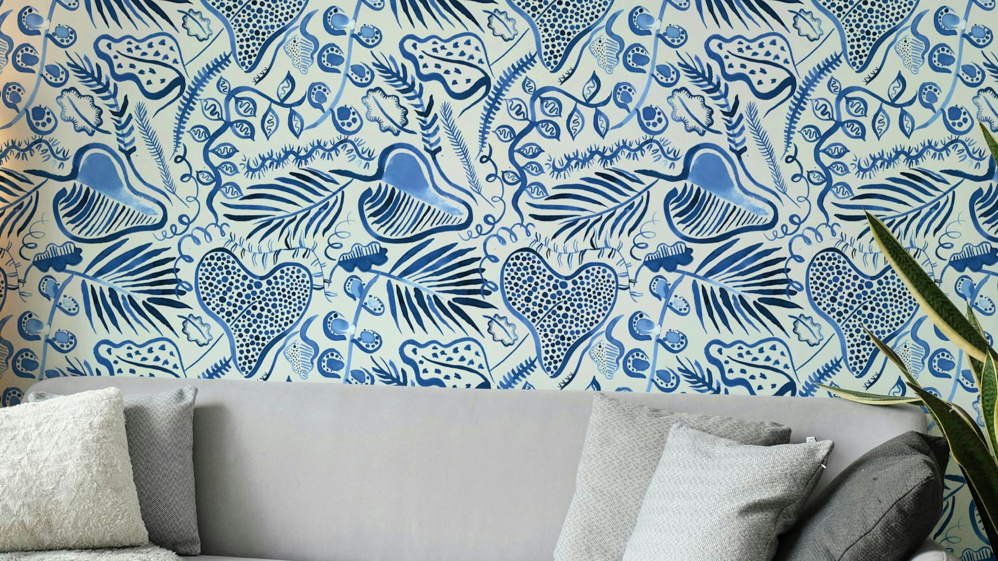 Deep jungle leaves wallpaper in shades of blue

