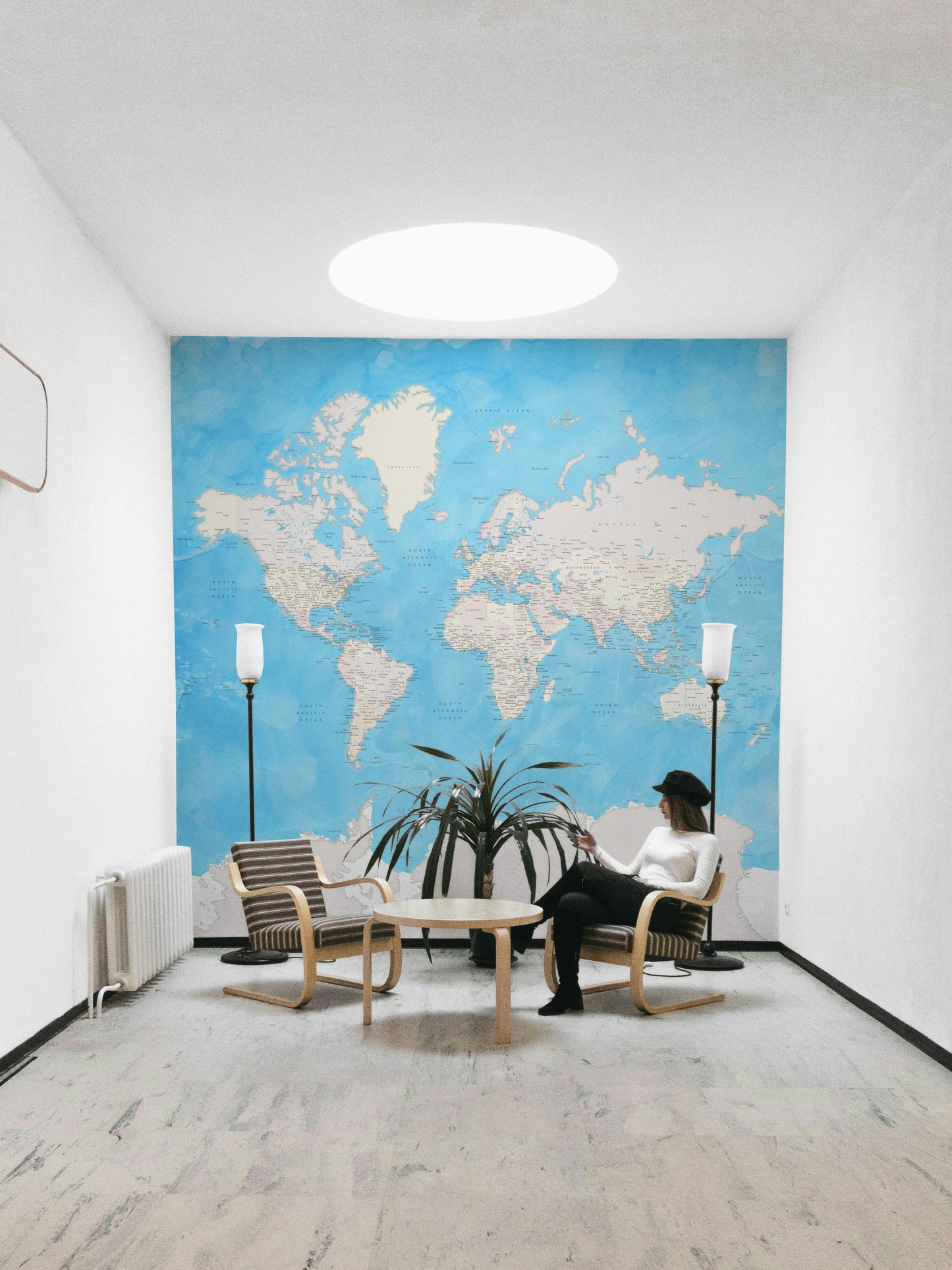 Soothing blue map mural for creative workspaces


