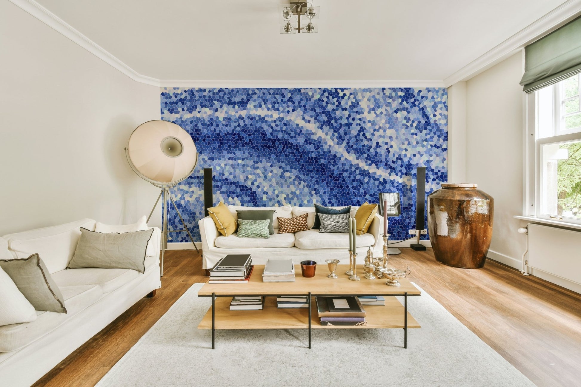 Features a mosaic pattern depicting ocean waves.

