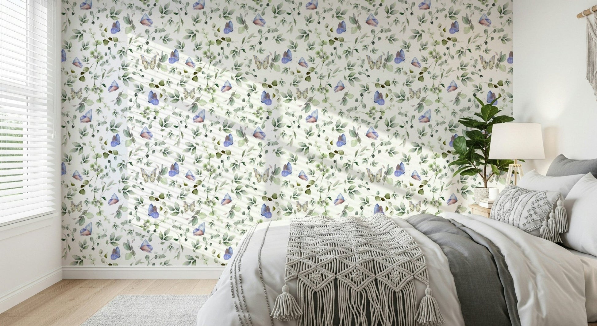 Interior design mockup of a studio apartment with large scale botanical wall art.