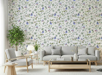Blue Pastel Butterfly Garden Wallpaper providing a soft background for a home workspace.