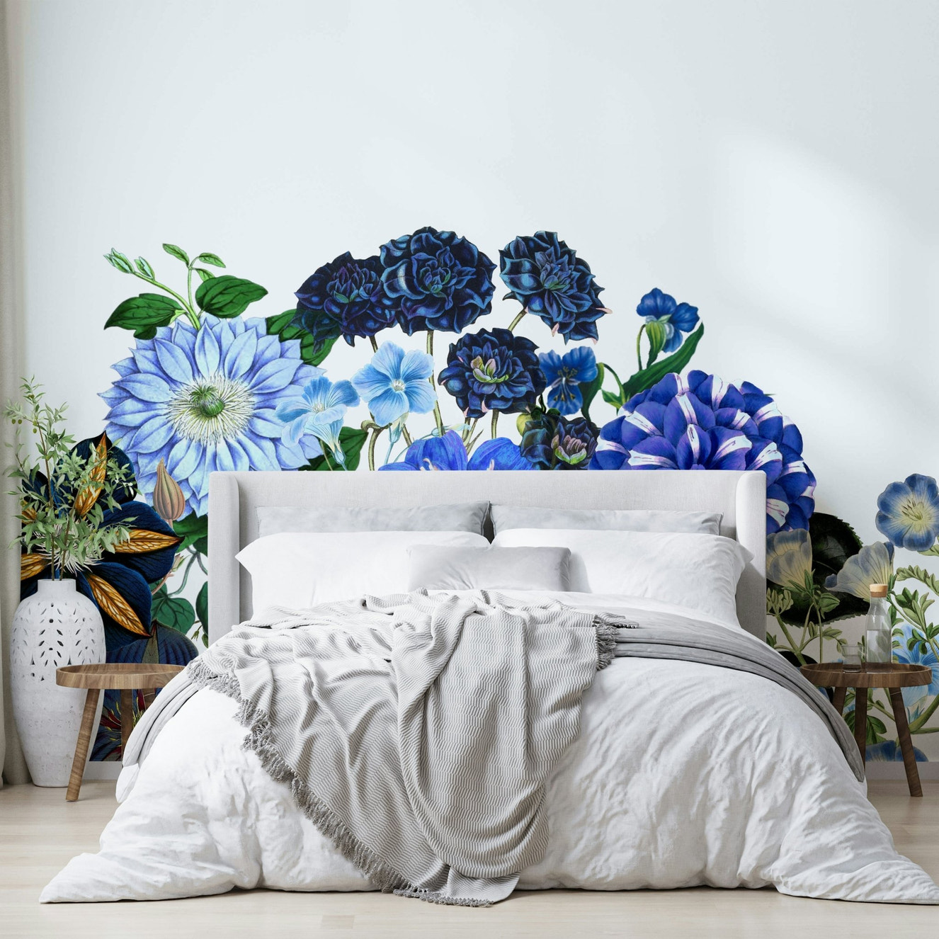 A detailed close-up of a blue and white floral wall mural.
