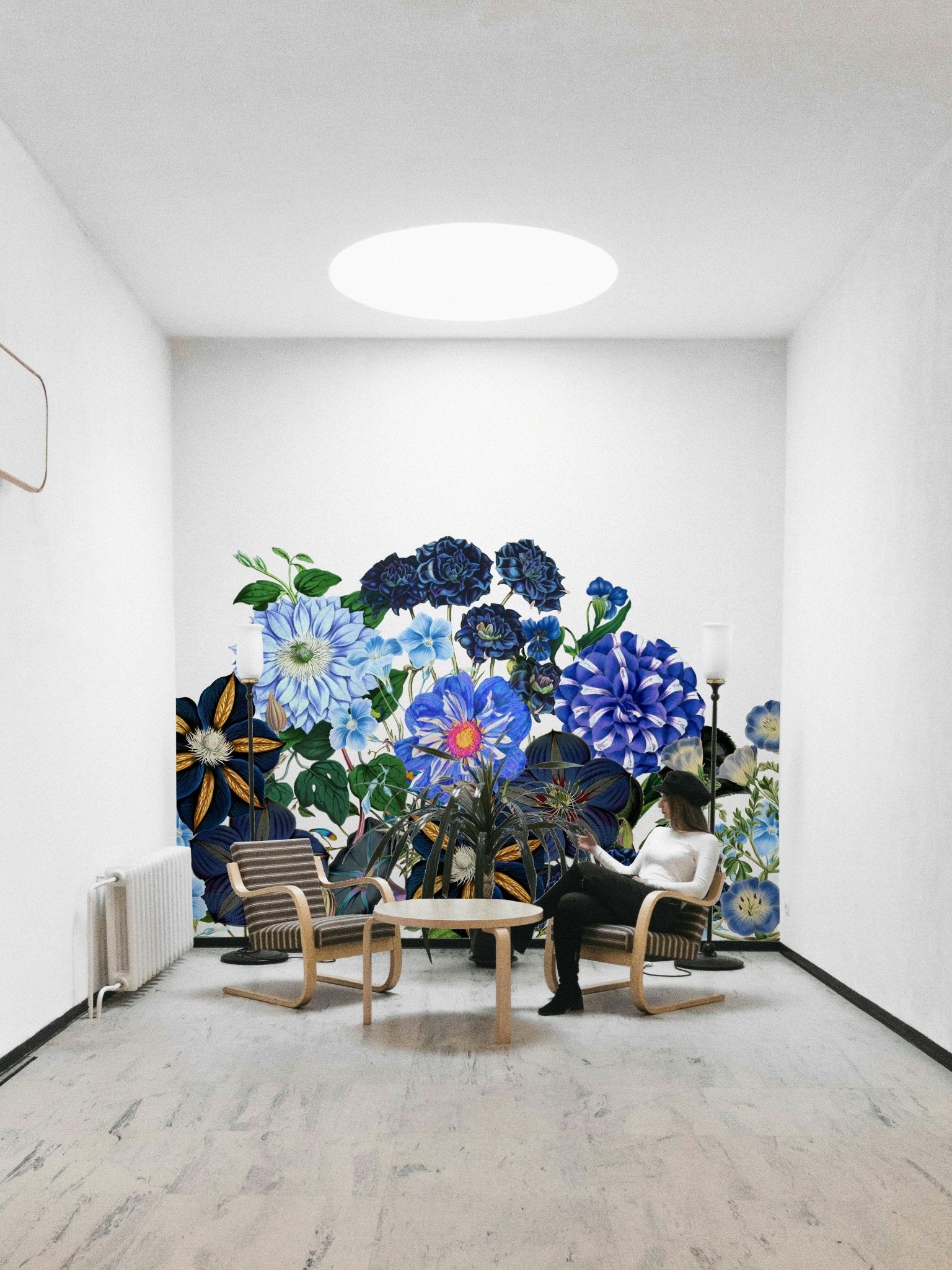 The background is a soft, light blue, almost a misty gray-blue.
