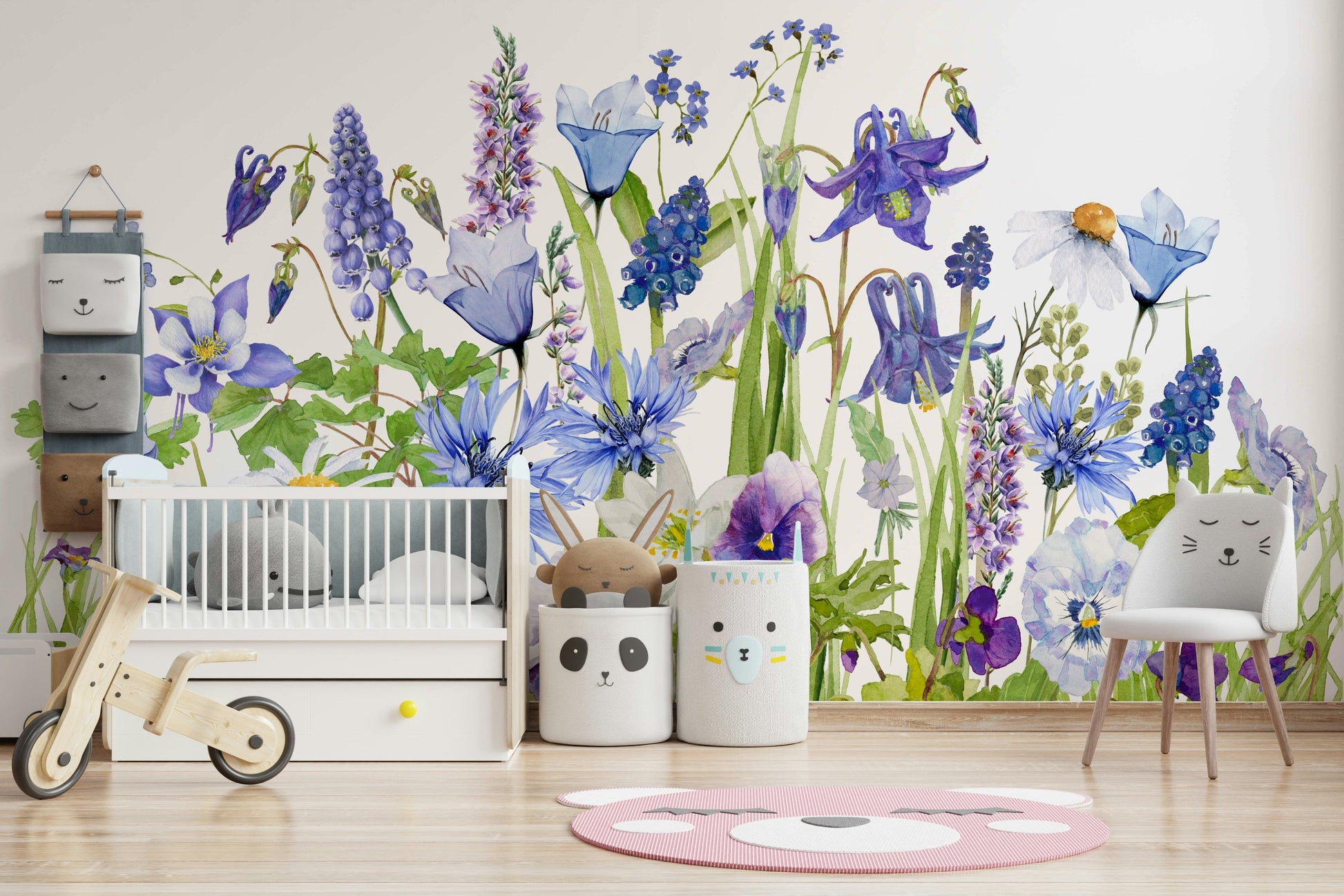 Wall mural with a blue watercolor wildflower meadow.

