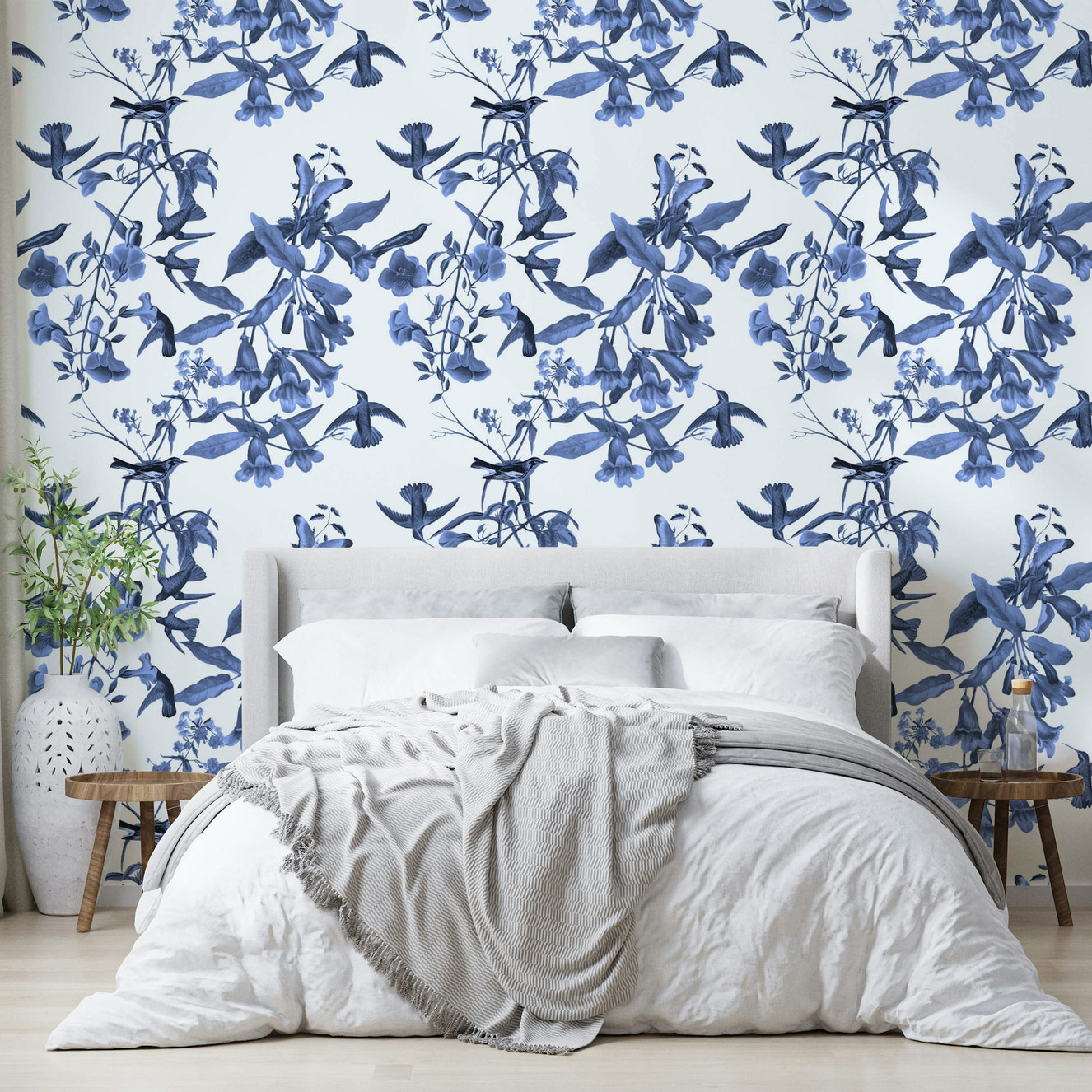 A peaceful nature scene mural on decorative wallpaper.

