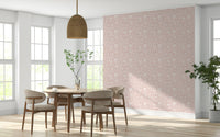 A soft pink wallpaper featuring repeated blooming flower motifs for a calming spring feel.