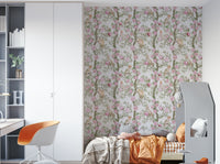 Bird and peony wallpaper offering contrast on dark tones.

