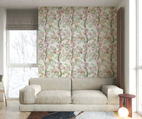 Wallpaper with birds resting on branches filled with peonies.

