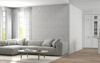 Blush Botanical Echo wall mural with gentle floral and leaf motifs for home decor.