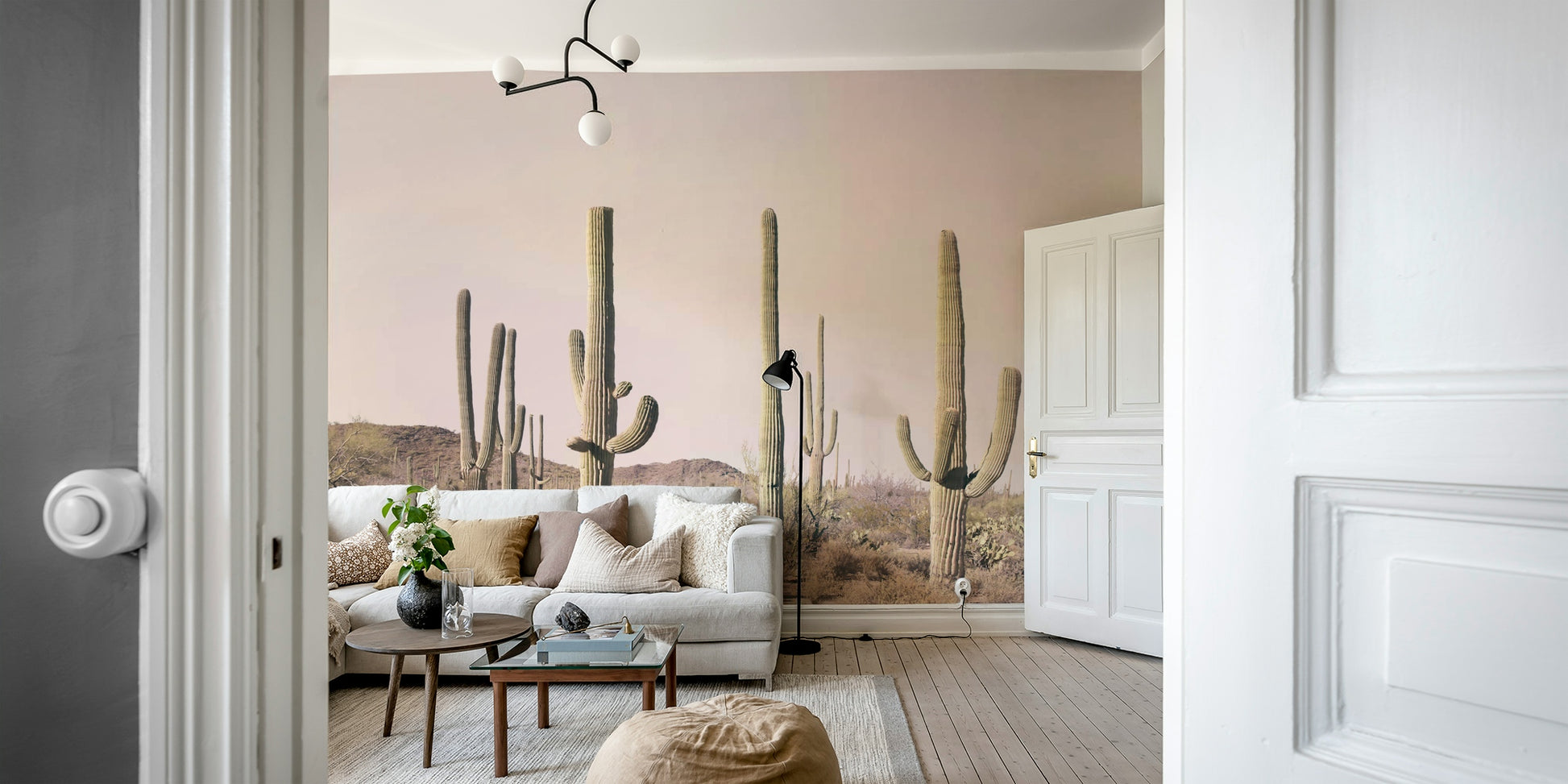 Neutral decor paired with blush cactus wall mural


