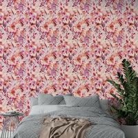 Botanical tropical wallpaper in blush and coral tones

