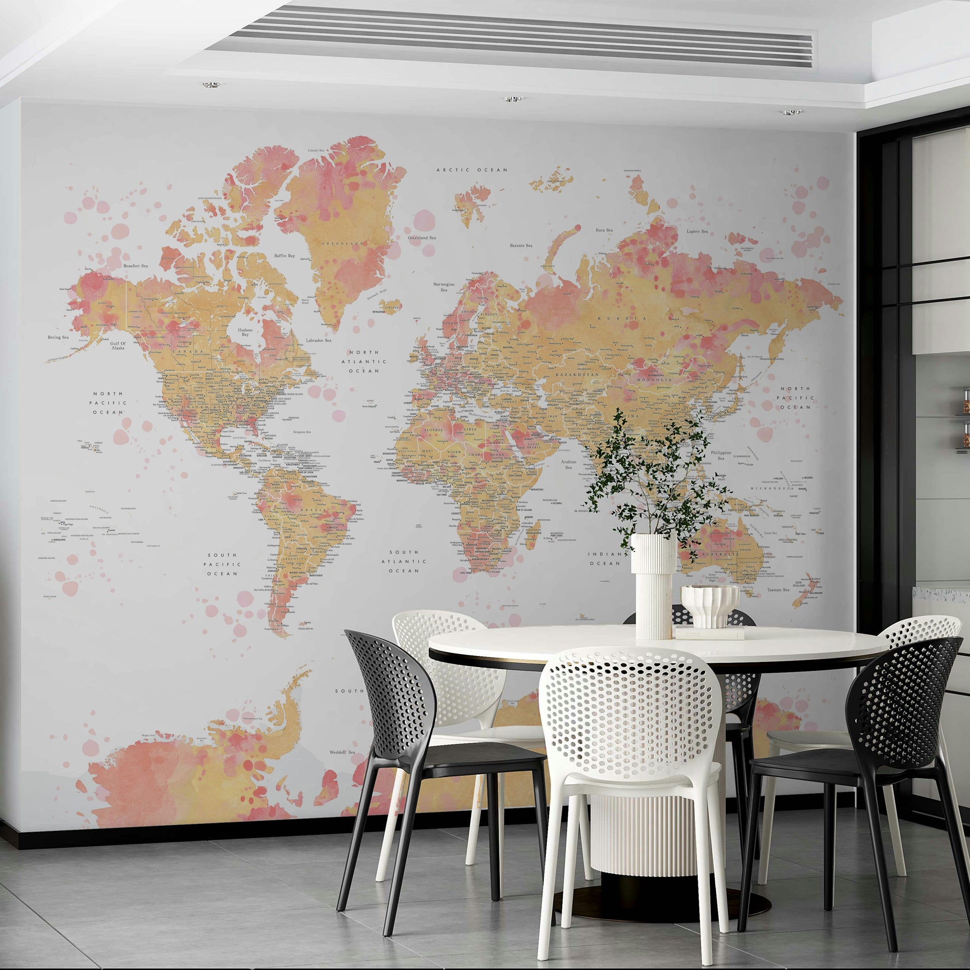 Watercolor world map in gentle blush and cream hues


